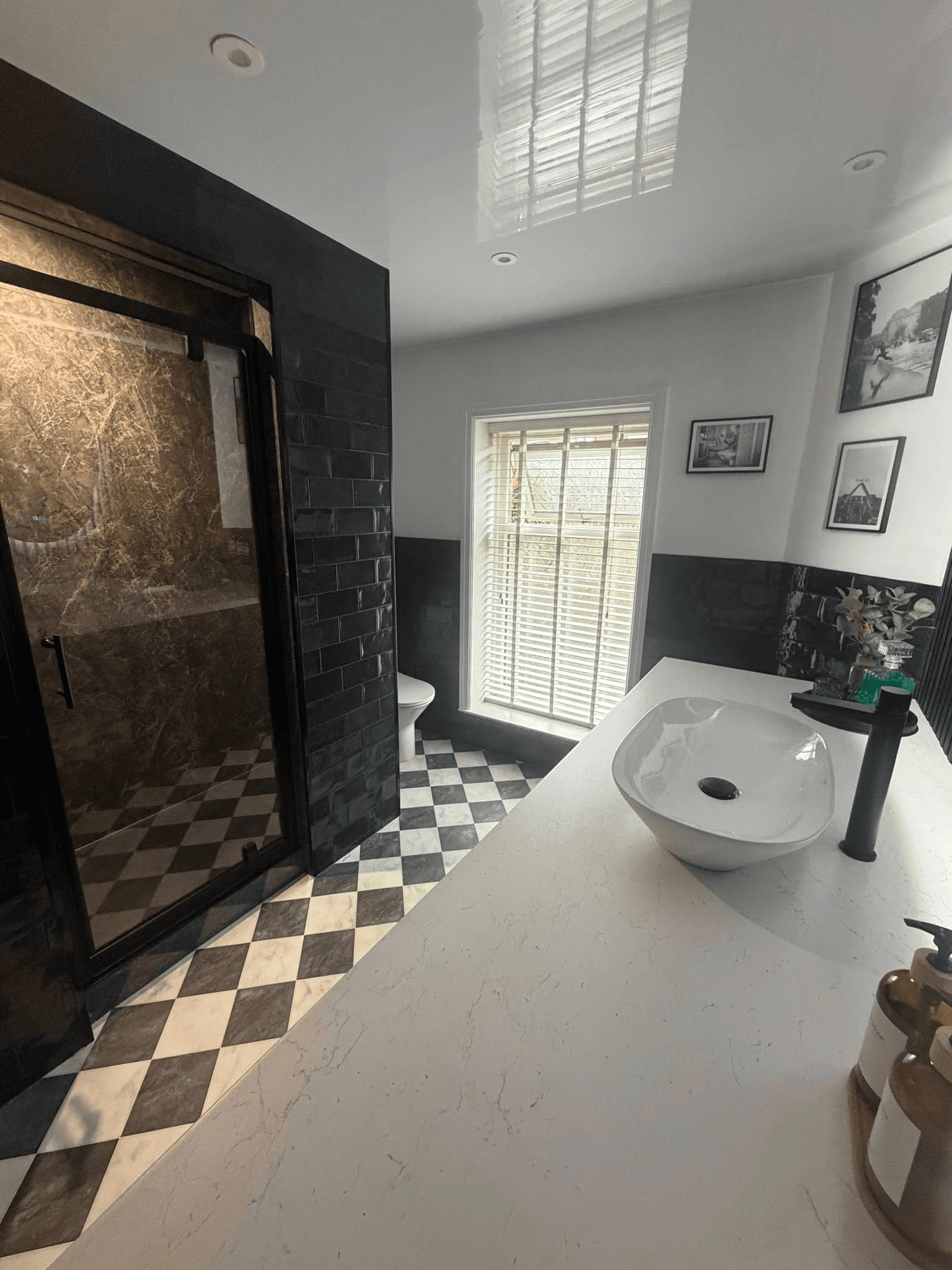 Checkerboard bathroom renovation in Darwen